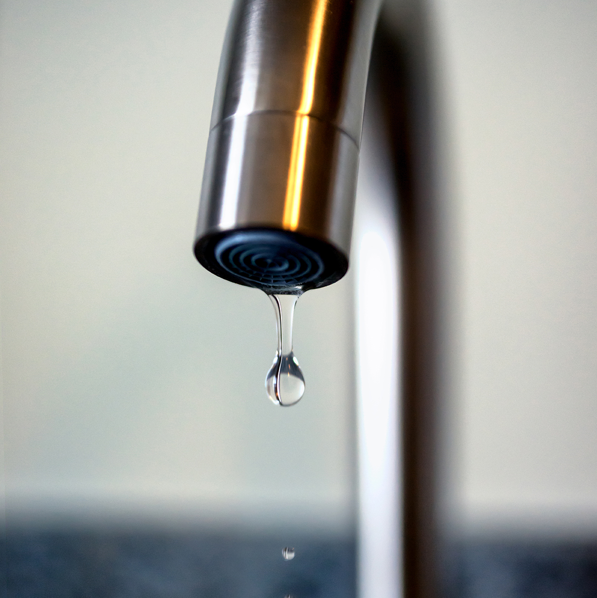 What could cause a dripping tap?